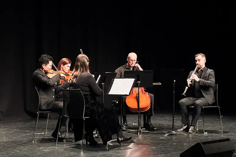 A local string quartet was joined by a solo clarinet player on stage. Photo_ Tony Devenish.-1 copy