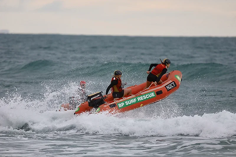 Emma Blackwell on a inflatable rescue boat in a race