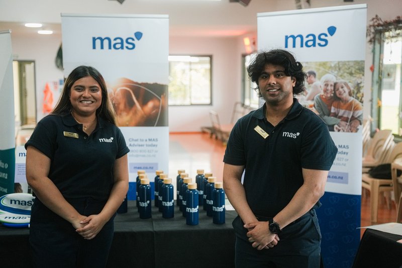 MAS Advisers Tanya and Sid at a stand