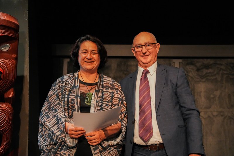 MAS senior adviser Larry Keane presents Dr Grace Malcolm with the Iwi Health Award