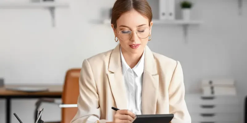 Woman looking at her notes during an interview